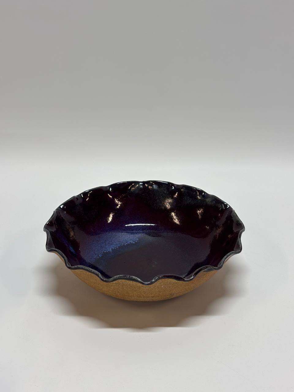Handmade Ceramic Bowl – Deep Purple Glaze with Raw Unglazed Clay Exterior, Ruffled Edge Stoneware